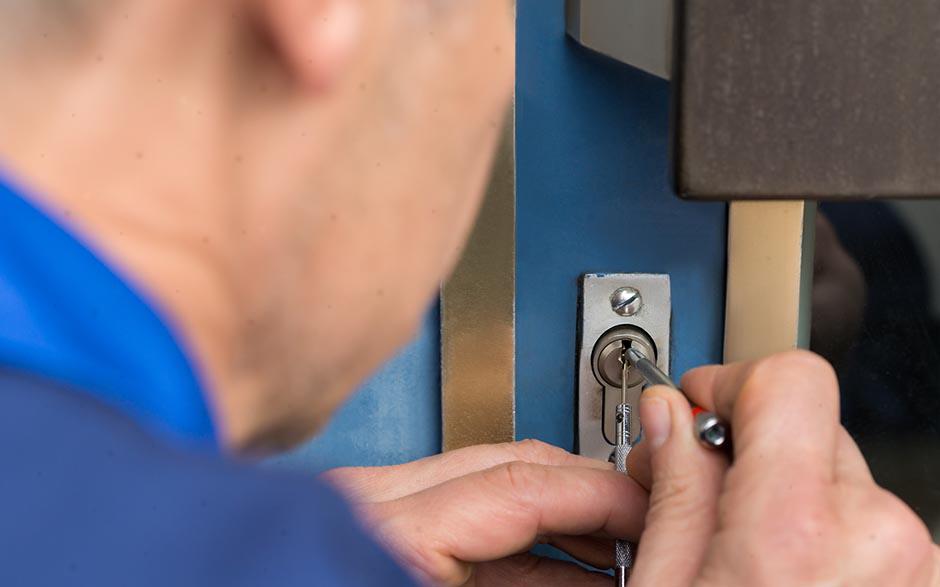 changer barillet porte garage Paris 4